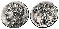 Coin of Pyrrhus, Kingdom of Epirus Head of Kore left, wreathed with grain, long torch behind / Athena Alkis advancing left, brandishing spear in right hand & holding shield on left arm, star before face, thunderbolt in left field, E in right field; inscription BAΣIΛEΩΣ ΠYΡΡOY (of King Pyrrhus).