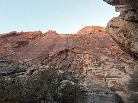 The left side of Black Velvet wall in Red Rock Canyon National Conservation Area features the five-pitch, sparsely protected Sandstone Samurai 5.11a X