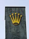 La couronne jaune, sigle de la marque