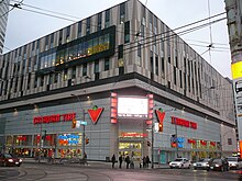 In 2006, a new wing of the Toronto Eaton Centre was opened, containing several stores, a parking garage, and Toronto Metropolitan University's Faculty of Business. Ryerson University.jpg