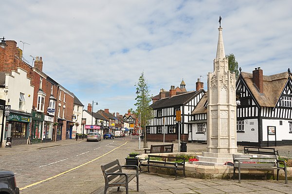 Sandbach cobbles with half-timbered pubs, the war memorial and the Saxon crosses