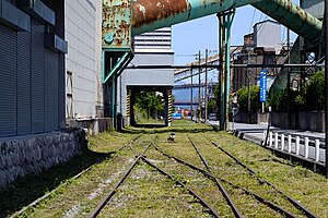 猿岩車站附近望向舊市橋站方向。圖中可看見裝載設備遺蹟。（2010年）