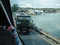 Southern Vectis 596 Hatherwood Point (NBZ 2184), a Volvo B10M/Plaxton Premiere 320 on Wootton Bridge, Wootton, Isle of Wight, operating a shuttle service between Ryde and the Bestival 2010 site at Robin Hill.