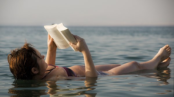 The Dead Sea - woman reading a book.jpg