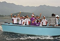 The Sports fraternity of Srinagar Valley taking the Queen's Baton Delhi 2010 for a ride in the Dal Lake of the Srinagar in Jammu and Kashmir on June 29, 2010.jpg