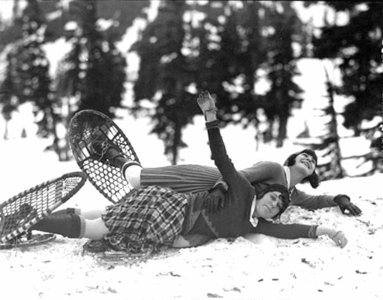 File:Two girls laying in the snow wearing snow shoes, Mount Baker, Washington (4497459637).jpg