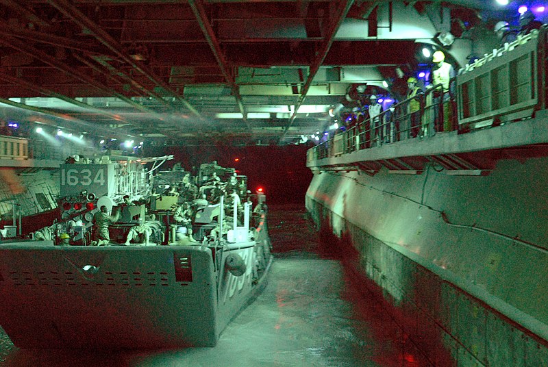 File:US Navy 070620-N-4010S-058 Sailors from USS Essex (LHD 2) and Assault Craft Unit 1 depart with a load of Marines and their equipment during a nighttime beach assault at Shoalwater Bay Training Area.jpg