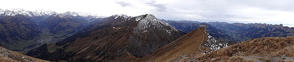 View of Niesen's peak from Fromberghore mountain, with Kandertal, Engstligental, and Simmental valleys.