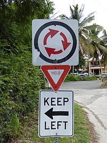 Road signs in the Virgin Islands Virgin Gorda, British Virgin Islands -- Road traffic signs (roundabout, yield, keep left).JPG