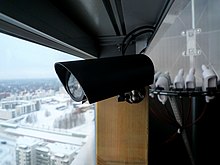 Webcam mounted on a building, used as a CCTV Webcam (5282372873).jpg