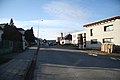 Čeština: Západní pohled do ulice Nádražní v Okříškách, okr. Třebíč. English: West view of Nádražní street in Okříšky, Třebíč District.