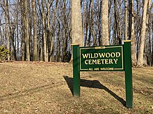 The sign at the main entrance of Wildwood Cemetery in Amherst, Massachusetts Wildwood Cemetery in Amherst entrance sign.jpg