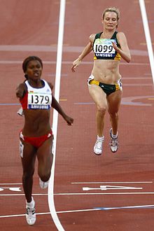 Julie Smith (right) in the 10m T46 final at the 2008 Beijing Games 100908 - Julie Smith finishes 100m T46 final - 3b - crop.jpg