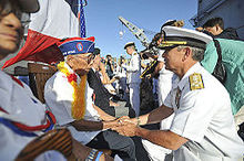 Adm. Harris thanking a 442nd Regimental Combat Team veteran for his contributions in World War II during a 2014 ceremony 140702-N-IT566-080.jpg