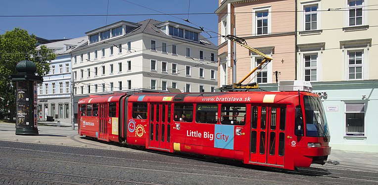 A red tram in downtown Bratislava