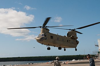 CH-47 Chinook helicopter landing on the deck of the Ex-USS Tarawa 3-25 Avn. practices non-combatant evacuation 150301-A-ZQ077-018.jpg