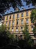 Apartment building in closed development with front garden