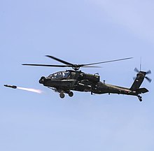 Boeing AH-64E Apache Guardian firing AGM-114R3 Hellfire missile Apache penerbad.jpg