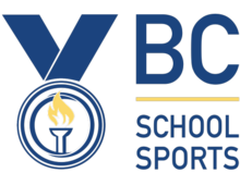 Current BC School Sports Logo (Design: The text "BC School Sports" in Dark Blue beside a dark blue medal with a yellow torch in the middle)