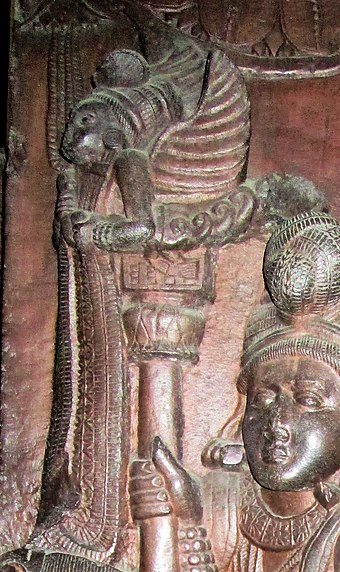 Relief depicting a portable Garuda pillar, one of the oldest images of Garuda, Bharhut, 100 BCE.[17]