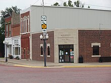 Many small rural towns such as Burlingame, Kansas (pictured) have no grocery stores. In Burlingame's case, the grocery store is substituted with a Dollar General store, which generally lacks essential groceries. The nearest grocery store from Burlingame, a Dillons Supermarket, is approximately 20.4 miles away near Topeka, Kansas. Burlingame kansas city hall.jpg