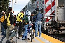 Commuters at Palo Alto Station boarding Caltrain Caltrain bikes palo alto.jpg