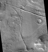Coloe Fossae Dikes and/or faults, as seen by HiRISE. Dikes and faults may have produced mineral deposits.