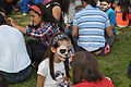 Girl has face painted in Mexico City, celebrating Day of the Dead, 2014.