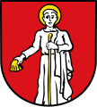 Markt Großlangheim In Rot der wachsende, silbern gekleidete und golden nimbierte Heilige Jacobus mit einer goldenen Muschel in der Rechten und einem goldenen Wanderstab in der Linken.