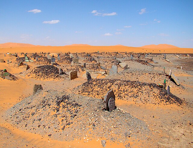 A Muslim cemetery in Sahara, with all graves placed at right angles to distant Mecca