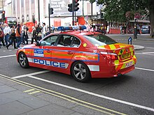 A red ARV of the Met's Protection Command, with yellow dot stickers Diplomatic Protection Group Car.jpg