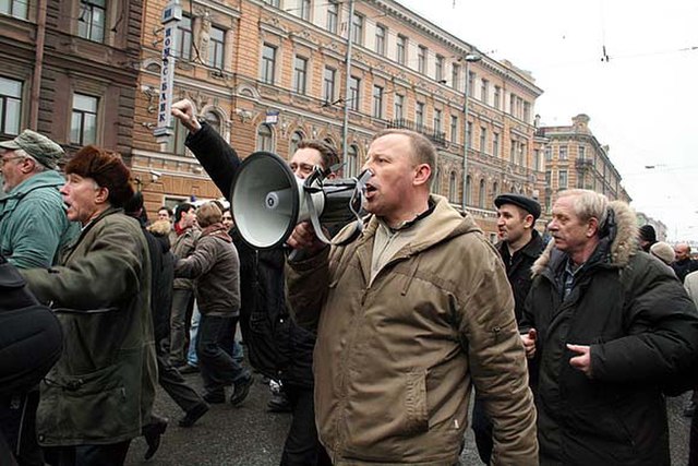 Sergey Gulyayev with a megaphone.