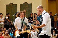 From left to right: Bradley Mehlenbacher and Brian Ross during a performance at Los Angeles Public Library in Los Angeles, California, in July, 2006