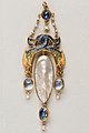 pendant with intertwined dragons, and sapphires