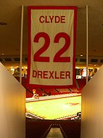 One of only five numbers retired by the University of Houston men's basketball team, Drexler's No. 22 hangs in the Fertitta Center. Drexler UH 22 CIMG1232.JPG