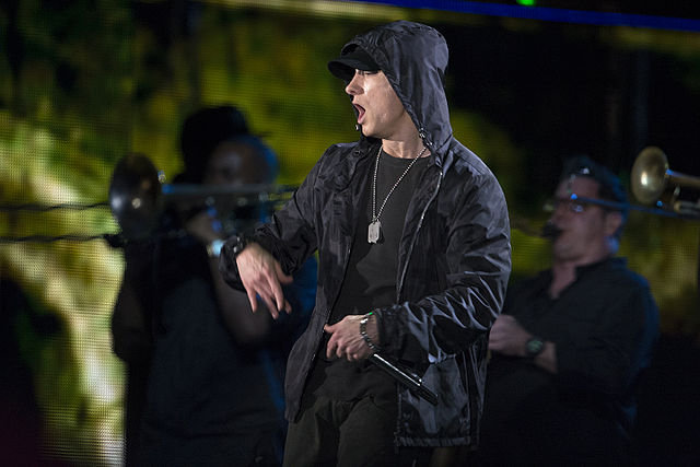 The album's opening track is "Couch Potato", a parody of Eminem's (pictured) single "Lose Yourself". Although Eminem approved of the parody, he vetoed
