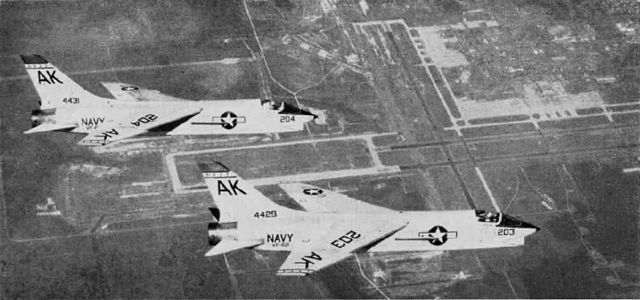 Two F8U-1s of VF-62 over NAS Cecil Field, 1962