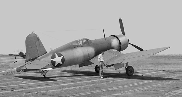 An early F4U-1 Corsair, with the recessed rear vision panels behind the sliding "greenhouse"-framed canopy.