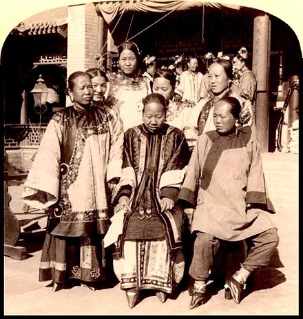Wealthy Chinese women with bound feet (Beijing, 1900). Foot binding was a symbol of women's oppression during the reform movements in the 19th and 20th centuries.
