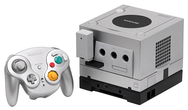 A Platinum GameCube with a WaveBird Wireless Controller and Game Boy Player attached