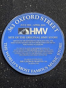A plaque unveiled by George Martin marking the location of a London office where EMI song publishers first heard Beatles demo recordings and pressed EMI to sign the group