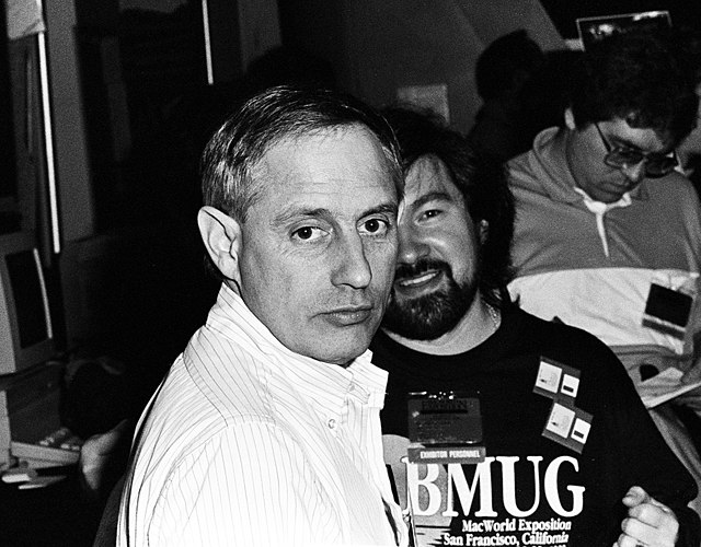 BMUG business manager Harry Critchfield and volunteer Herb Dang, staffing the BMUG booth at MacWorld Expo San Francisco in January 1989.