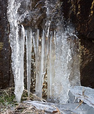 Icicles on a granite cliff in Lysekil, Sweden