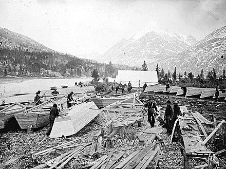 Wooden boats under construction during the Klondike Gold Rush