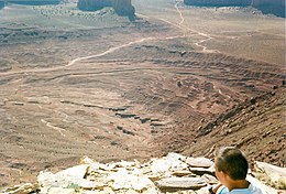 Layers in Monument Valley, Utah. These are accepted as being formed, at least in part, by water deposition. Since Mars contains similar layers, water remains as a major cause of layering on Mars.