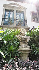 Luís de Camões Statue in the Edifício do Instituto para os Assuntos Municipais (Leal Senado) in Macau, China (Source: Wikimedia)