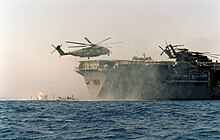 Un Sea Dragon apponte sur l'Inchon (1999).