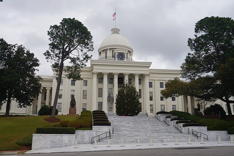 A street-level view of the Alabama State Capitol in Montgomery, Alabama.