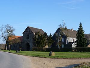 Castle with castle gate and farmhouse