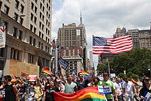 Participants at the NYC Pride March in June 2011 celebrating the legalization of same-sex marriage, with signs reading "Thank you Governor Cuomo" New York Gay Pride 2011.jpg